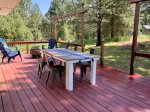 Back patio w/dining table, propane grill, fire pit and adirondacks